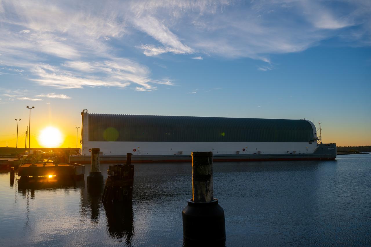 Teams at NASA’s Michoud Assembly Facility in New Orleans move the engine section flight hardware to the agency’s Pegasus barge Sunday, Dec. 4. The barge will ferry the engine section of NASA’s Space Launch System (SLS) rocket for Artemis III to the agency’s Kennedy Space Center in Florida. Once there, teams at Kennedy will finish outfitting the engine section, which comprises the tail-end of the rocket’s 212-foot-tall core stage, before integrating it to the rest of the stage. Beginning with production for Artemis III, NASA and core stage lead contractor Boeing will use Michoud, where the SLS core stages are currently manufactured, to produce and outfit the core stage’s five elements, and available space at Kennedy for final assembly and integration. Photo Credit: (NASA/Jared Lyons)